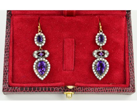 A PAIR OF AMETHYST, SEED PEARL AND DIAMOND EARRINGS, each designed as a pear shape amethyst within a seed pearl surround with