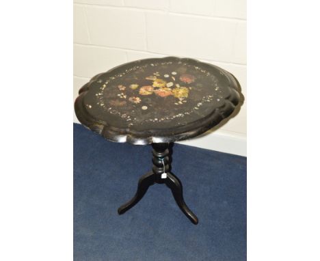 A VICTORIAN PAPIER MACHE TILT TOP TEA TABLE, of a shaped oval form, black lacquered mother of pearl inlay and painted floral 