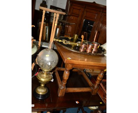 A VICTORIAN BRASS OIL LAMP with an etched glass shade, a reproduction coffee table and a plant stand (3)