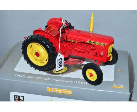 A BOXED UNIVERSAL HOBBIES DAVID BROWN 990 IMPLEMATIC TRACTOR (1961), 1:16 scale, appears complete and looks to have hardly ev