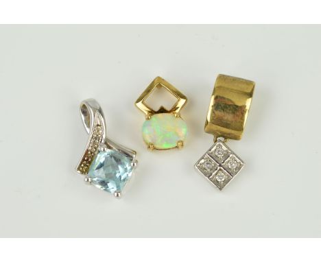 THREE GEM SET PENDANTS to include an opal single stone, a 9ct white gold blue topaz and diamond, a diamond drop pendant, appr