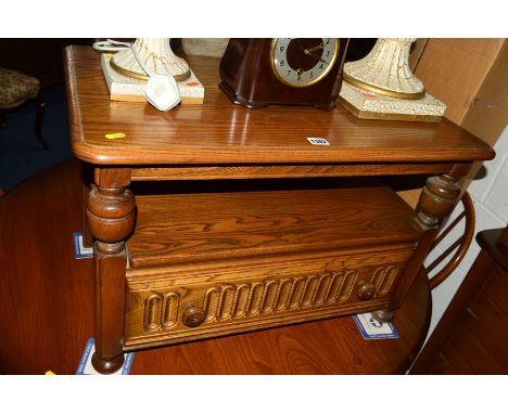 AN ERCOL ASH TV STAND, with a triangular drop back and a single drawer, width 74cm x depth 45cm x height 48cm together with a