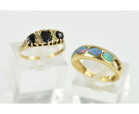 TWO 9CT GOLD GEM SET RINGS, the first designed with four oval opal doublets and one vacant setting, ring size J1/2, the secon