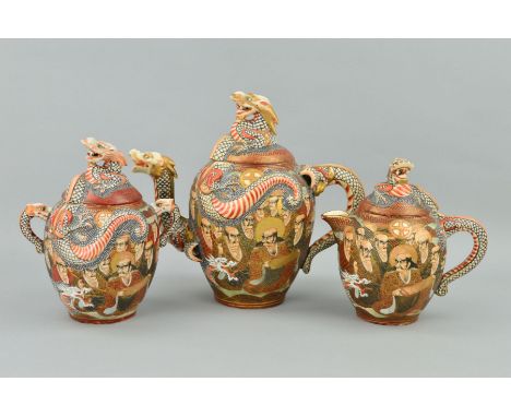A THREE PIECE SATSUMA WARE TEA SERVICE, decorated with dragons and immortals, (lid on sugar restored) (3)