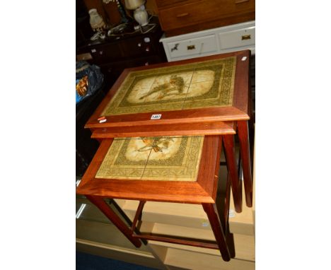 A DANISH TEAK TILE TOPPED NEST OF THREE TABLES, marked Mobelfabriken, Denmark