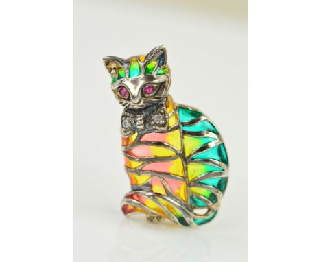 A GEM AND PLIQUE A JOUR CAT BROOCH, designed as a cat with ruby eyes, (possibly synthetic) diamond set bow tie and green, yel