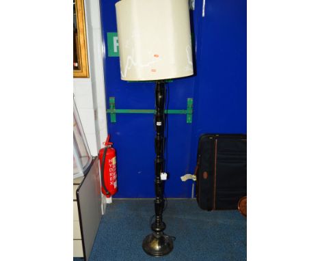 A METAL FRAMED JAPANESE STYLE STANDARD LAMP with a cylindrical shade, height 183cm