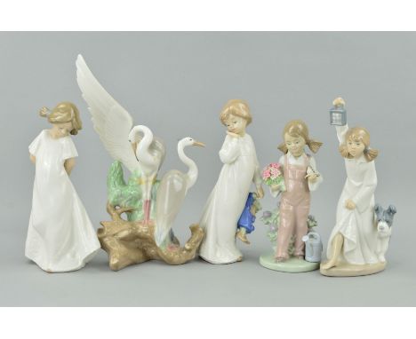 A LLADRO FIGURE, 'Spring' No.5217 (broken arm and hand), together with three Nao figures of young girls in nightgowns and a N