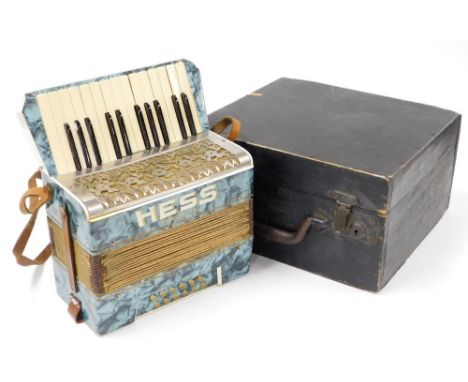A Hess cased accordion.
