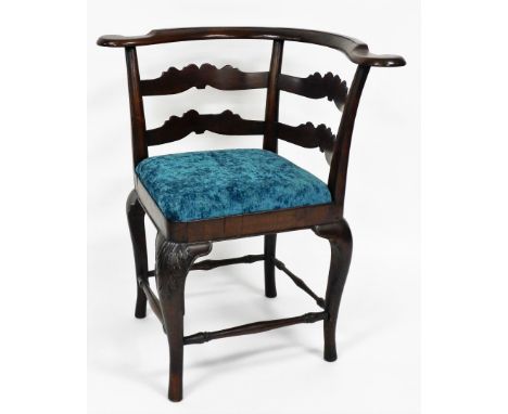 An 18thC and later walnut corner chair, with shaped ladder back, drop in seat on splayed feet, 80cm high. 