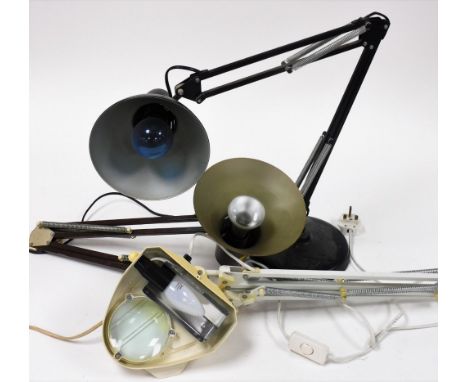 A group of angle poise lamps, to include a black angle poise desk lamp and a brown and white desk mountable angle poise lamp.