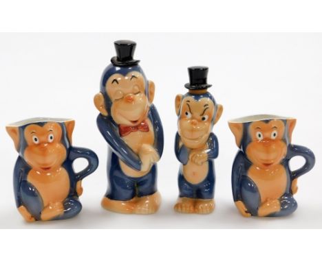 A group of Goebel monkey character jugs and decanters, to include two jugs and a small and large decanter. (4)