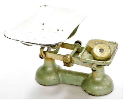 A set of Avery kitchen scales, painted in green metallic finish with enamel bowl and two weights, 18cm high, 34cm wide. 