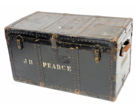 A leather and wood bound travelling trunk, bearing the initials JH Pearce of Norfolk Rgt, 50cm high, 92cm wide, 50cm deep. 