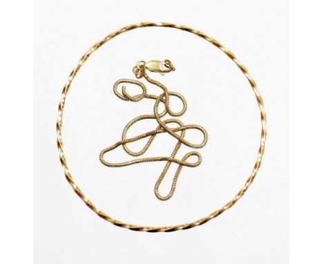 Two items of jewellery, to include a yellow metal bangle, unmarked, and a 9ct gold heart snake chain (AF), 34cm long, 6.6g al