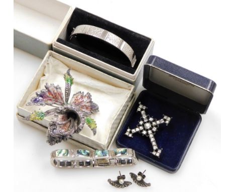 A group of jewellery, to include an Edwardian steel cut and paste stone set crucifix pendent, pair of silver and marcasite ea