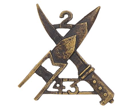 Indian Army. 2nd Bn. 43rd Erinpura Regiment cap/pagri badge circa 1903-21.Good scarce locally cast blackened brass crossed In