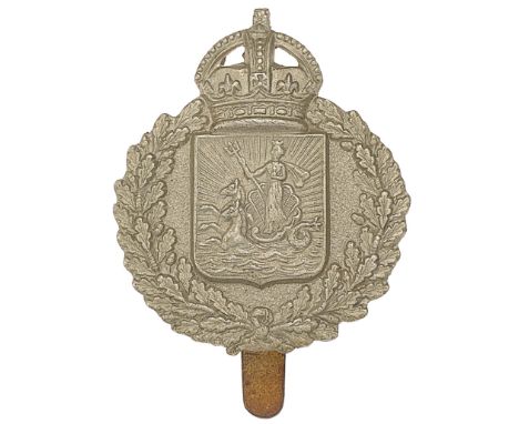 Barbados Police pre 1953 cap badge.Good die-stamped white metal crowned shield, charged with Neptune, crowned and holding her