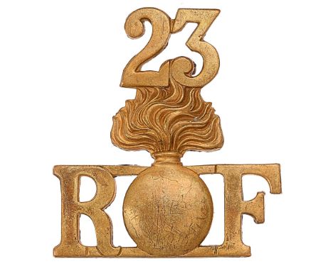 23 / R grenade F “Kitchener’s Army” WW1 brass Royal Fusiliers shoulder title.Good scarce die-cast example.  Loops VGC23rd (1s