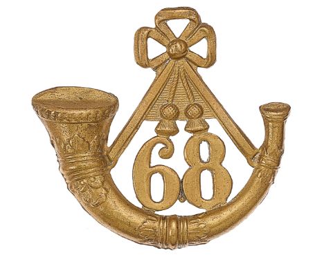 68th (Durham Light Infantry) Regiment Victorian OR’s glengarry badge circa 1874-81.Good die-stamped brass strung bugle horn w