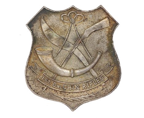 Burma. 1st Bn. Chin Rifles badge.Scarce die-stamped silvered shield bearing strung bugle, rifle and native sword with title s