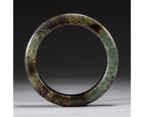 Jade ring during the Red Mountain period of China    Diameter:9.2cm       Weight:186g