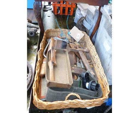 A tray of old tools.