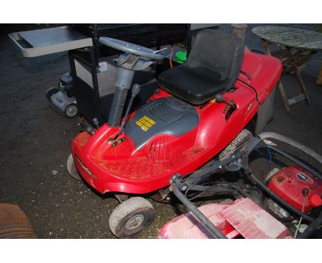 A "Castle Garden" XE70 ride-on lawn mower. Electric start. (Engine will not turn with pull-cord).