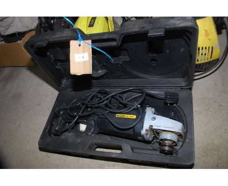 A "Wickes" angle grinder.