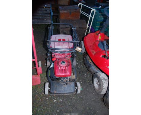A "Mountfield" lawn mower (The engine turns and has good compression).