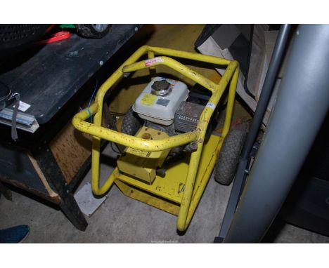 A K'archer HD 801B pressure washer with Honda  petrol engine. (Has good compression).
