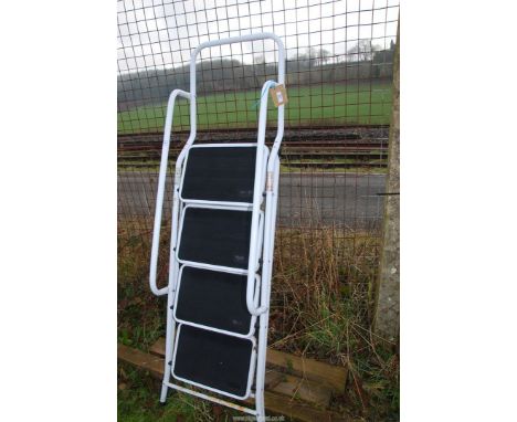 A four rung non-slip folding step ladder.