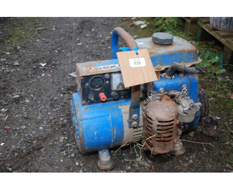 A "Seki" 220 volt generator (Engine stiff to turn).