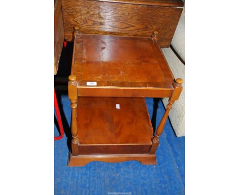 A veneered side table with lower shelf.