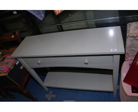A grey painted Hall Table with frieze drawer and lower shelf, 39 1/2" wide x 12 1/2" deep x 29 1/2" high.