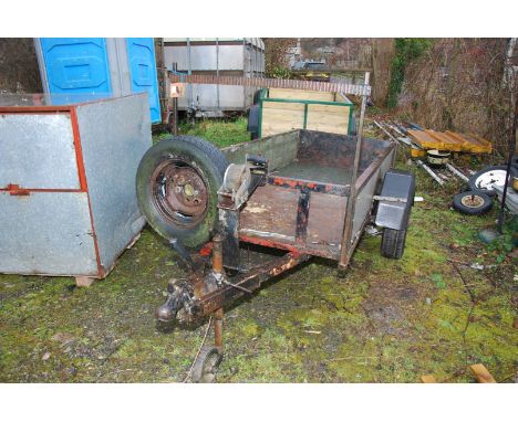 A single axle trailer with ladder rack and winch.