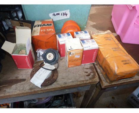 Eight new A50/60 Oil FIlters, one new A40 Somerset oil filter, two A50/60 rear axle oil seal retainers and six A50/60 engine 