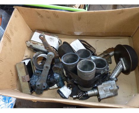 .A quantity of parts and spares including a 1622 cc engine oil rocker filler can, A50/55 ashtrays, dynamo coil brackets, A50 