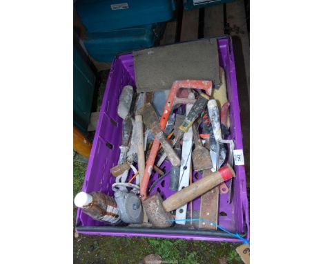 A tray of builders tools to include: trowels, scrappers, etc.