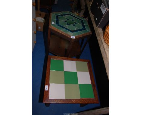 An occasional table, coffee table both having tile tops.