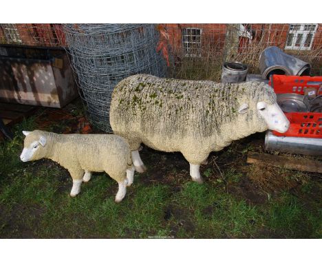 Plastic Ewe and lamb garden ornaments, the ewe is 27" tall.