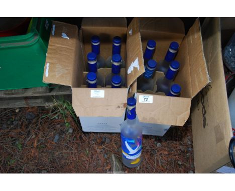 Two boxes of empty "Grey Goose" vodka bottles.