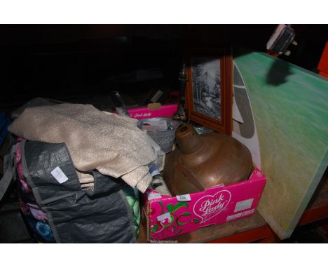 A canvas picture, a box of miscellaneous and a bag of curtains.