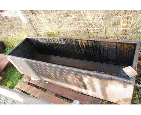 A 5' galvanised water trough.