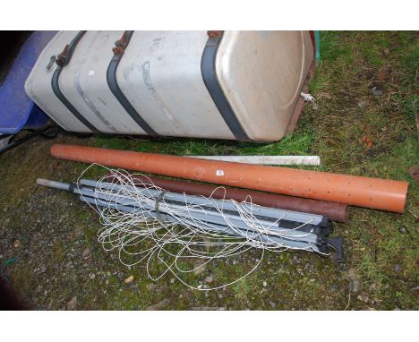 A rotary washing line and plastic piping.