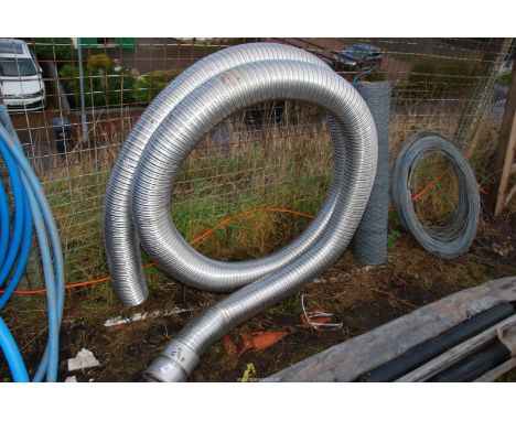 A quantity of flexible flue pipe.