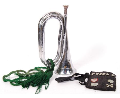 A collection of vintage Boys Brigade related items to include; a Boosey &amp; Hawkes bugle, with green tassle and a small col