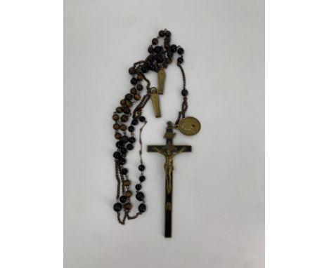 A vintage brass crucifix with rosary beads and medallion. H.20cm (crucifix) 
