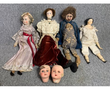 A collection of vintage and antique dolls to include two doll's heads. H.31cm (largest) 
