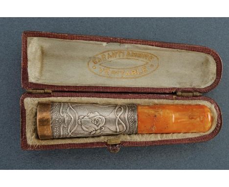dating: First half of the 20th Century provenance: France, Amber mouth, front part covered with silver foil, embossed with a 
